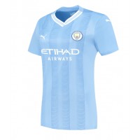 Camiseta Manchester City John Stones #5 Primera Equipación para mujer 2023-24 manga corta